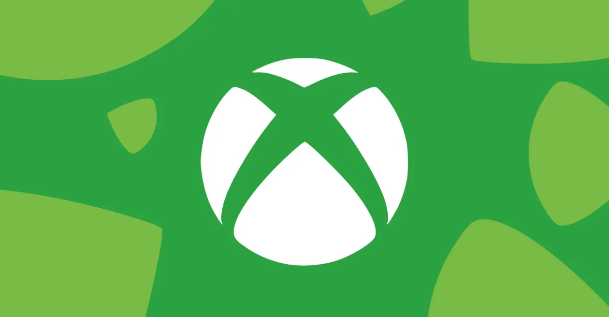 Логотип Xbox на фоне игровой консоли